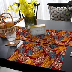 Pacific Blue & Rust Orange Tropical Leaves on Burgundy Background | Table Runner and Placemat Set